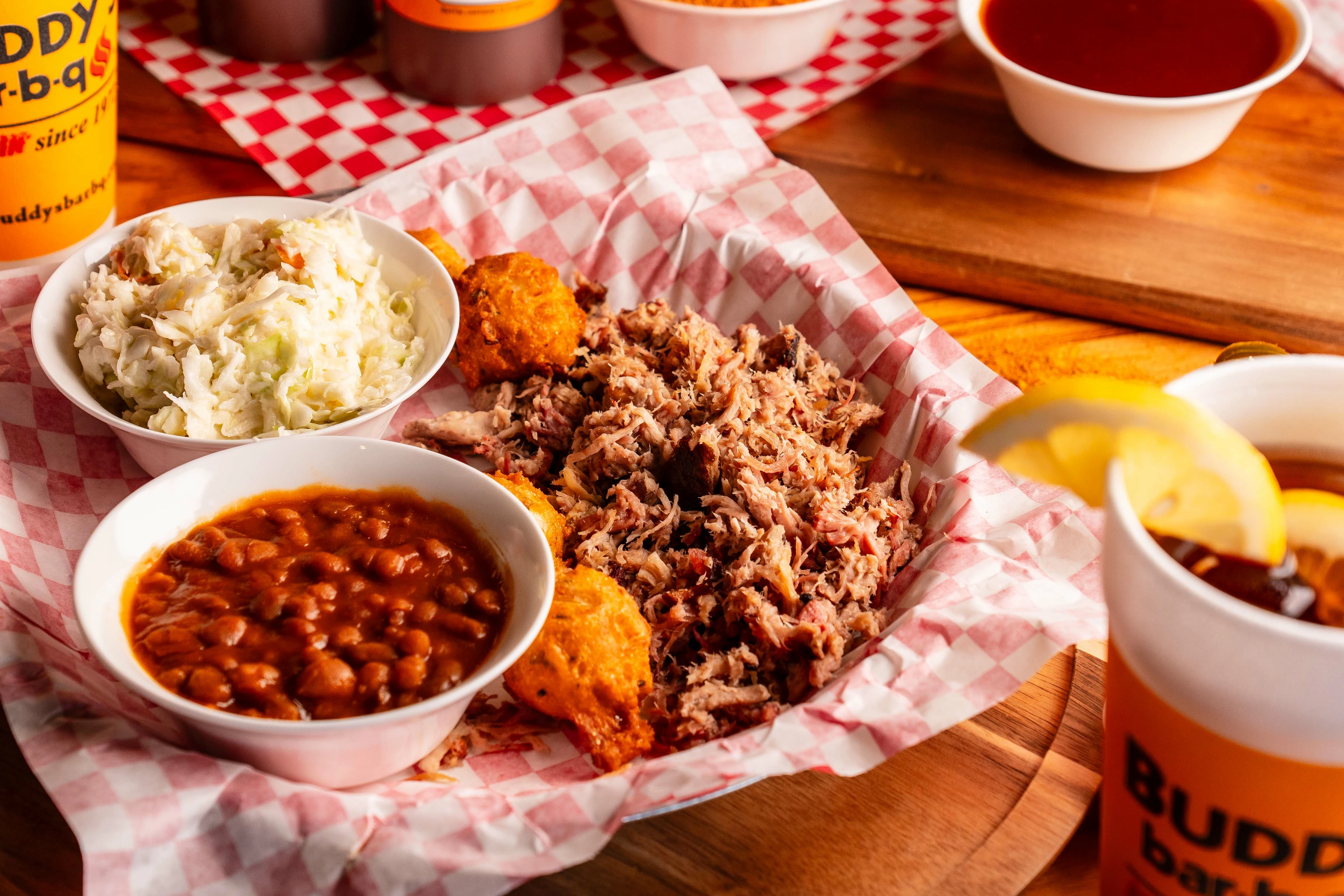 pulled pork with sides and hushpuppies